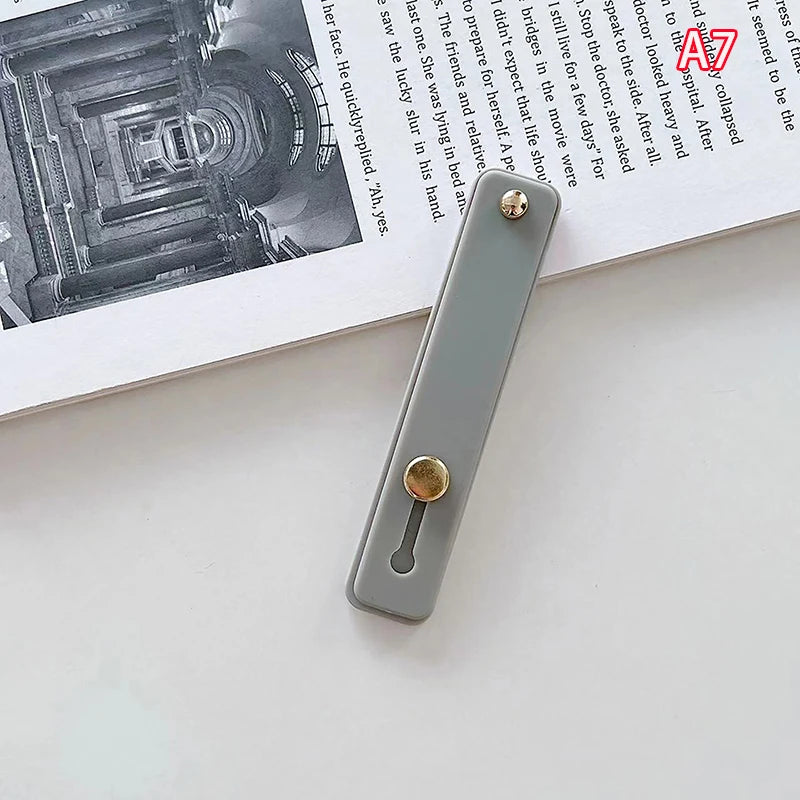 1pc Universal Silicone Wristband Phone Holder Finger Ring Phone Hand Band Bracket Push Pull Grip Phone Stand Sticker Accessories